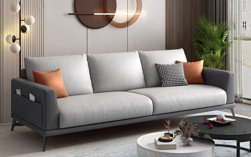 sofa xám gối cam